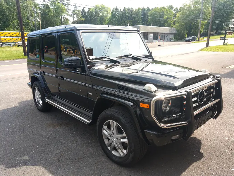 Black Mercedes G‑Wagon angled left — finished ceramic coating cars
