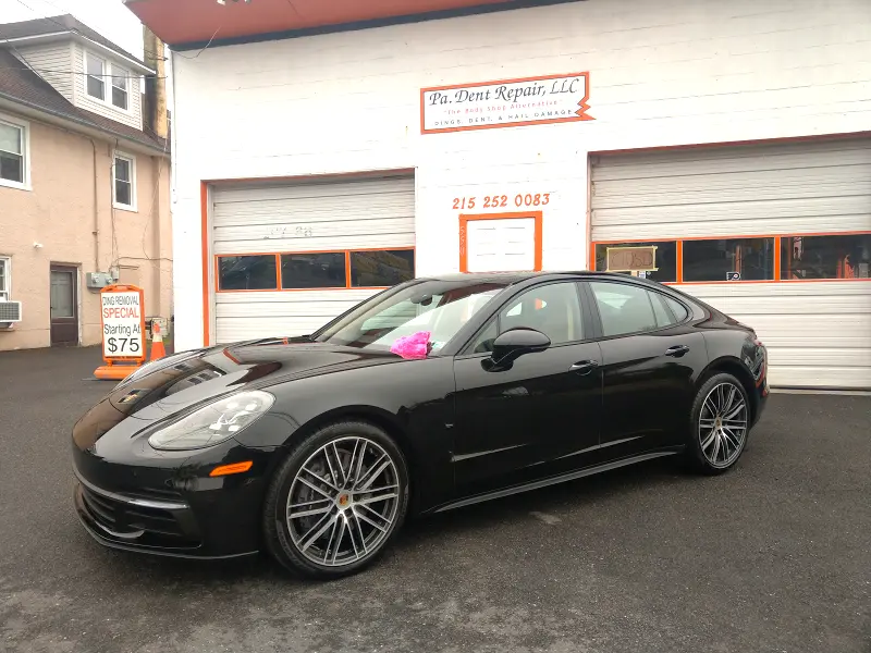 Black Porsche angled right — ceramic coating car results