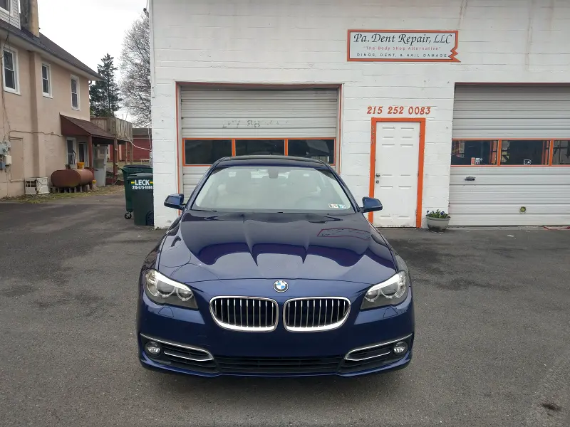 Dark blue BMW sedan centered — finished ceramic coating cars