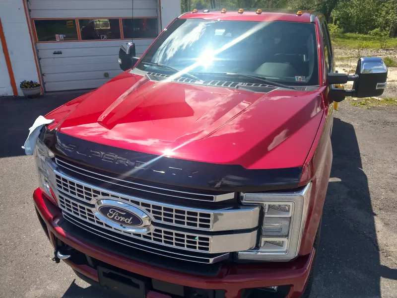 Red Ford truck centered — ceramic coating showcase