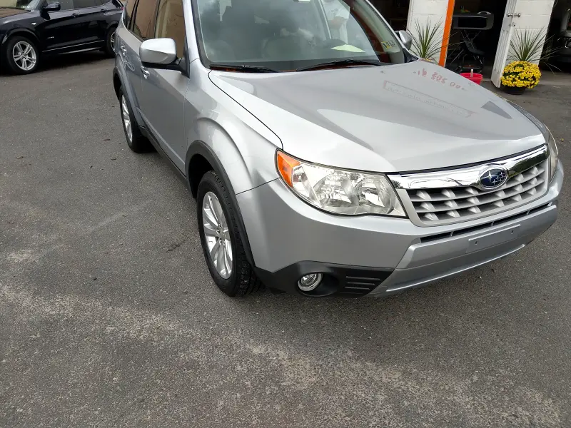 Silver Subaru sedan centered — finished ceramic coating cars