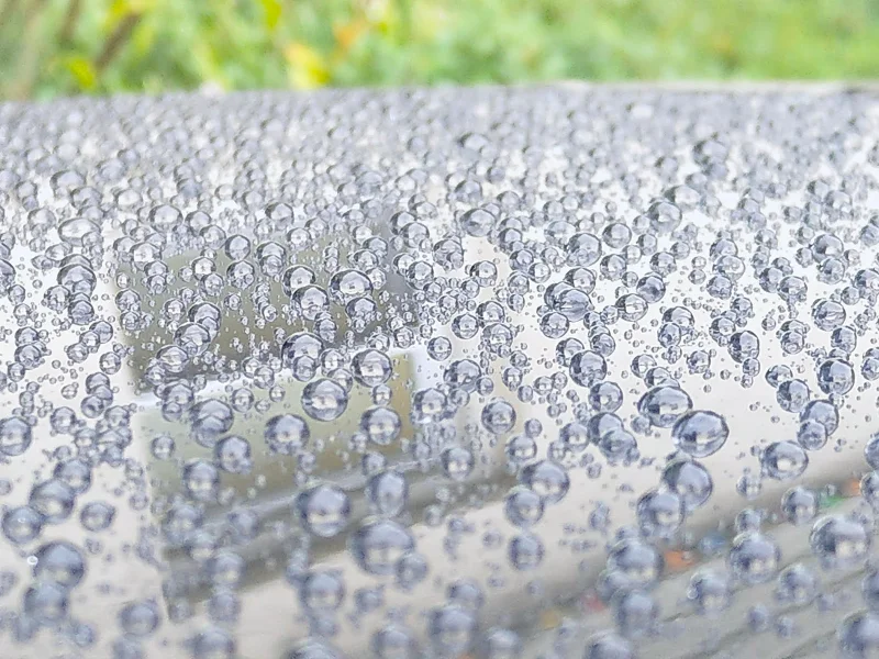 Superior water beading from ceramic coating on black hood